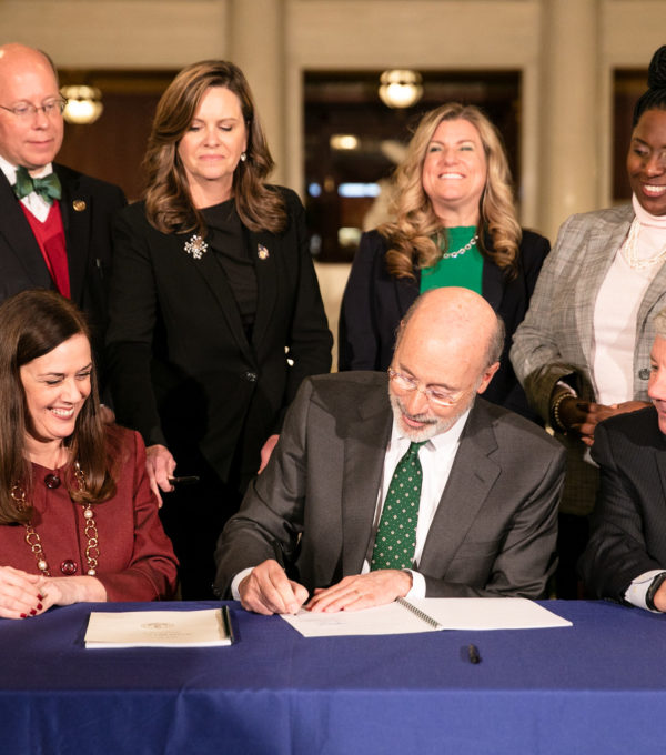 Photo of bill signing.
