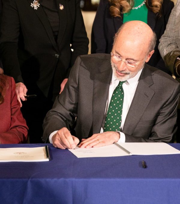 Photo of bill signing.