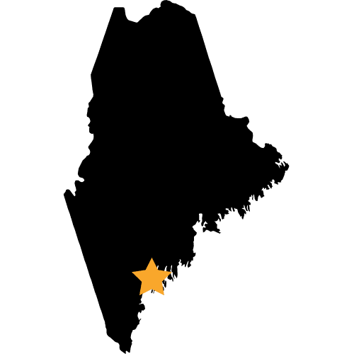 Image of the state of Maine with a star over Portland 