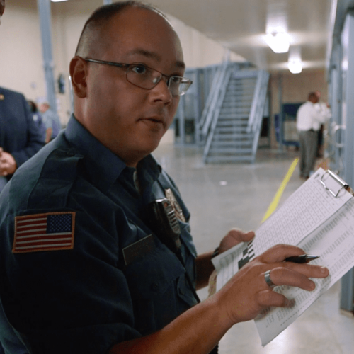 Image of officer with a clipboard