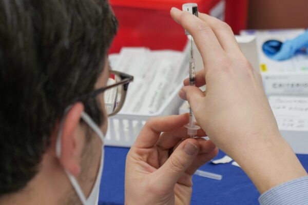 Pharmacist preparing vaccine