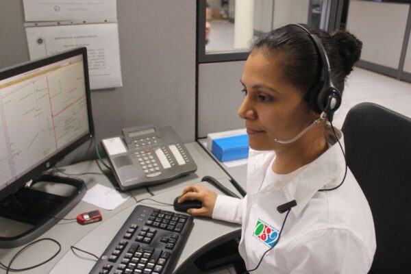 woman answering emergency calls