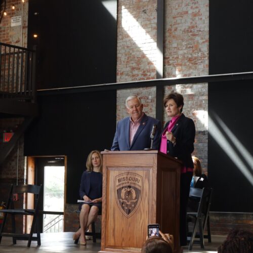 Missouri Governor Mike Parson and former Department of Corrections Director Anne Precythe speak at the Reentry 2030 launch event