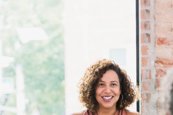 A female case manager speaks to a client