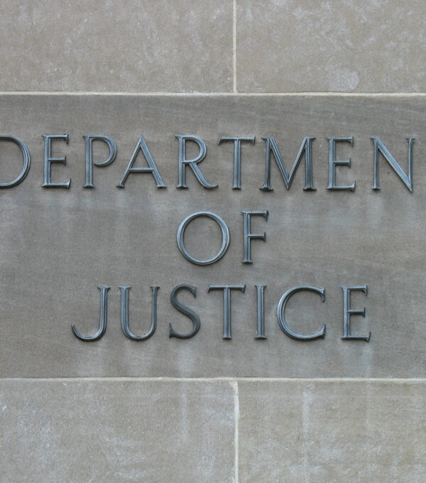 Department of Justice sign on building