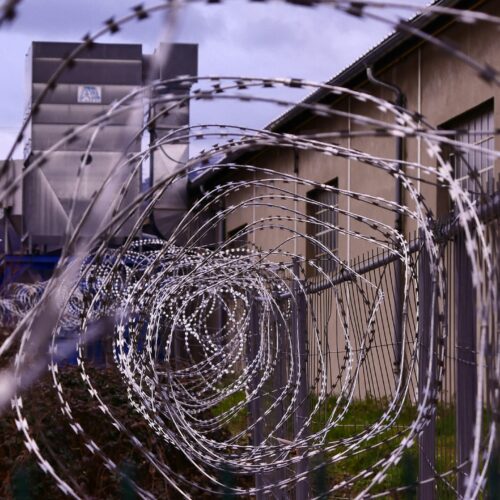 spiral barbed prison wire fence