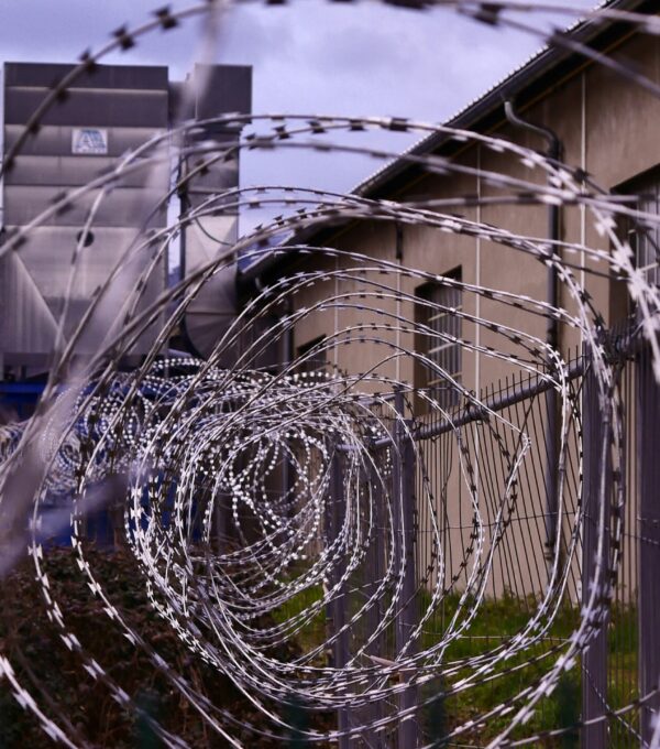 spiral barbed prison wire fence